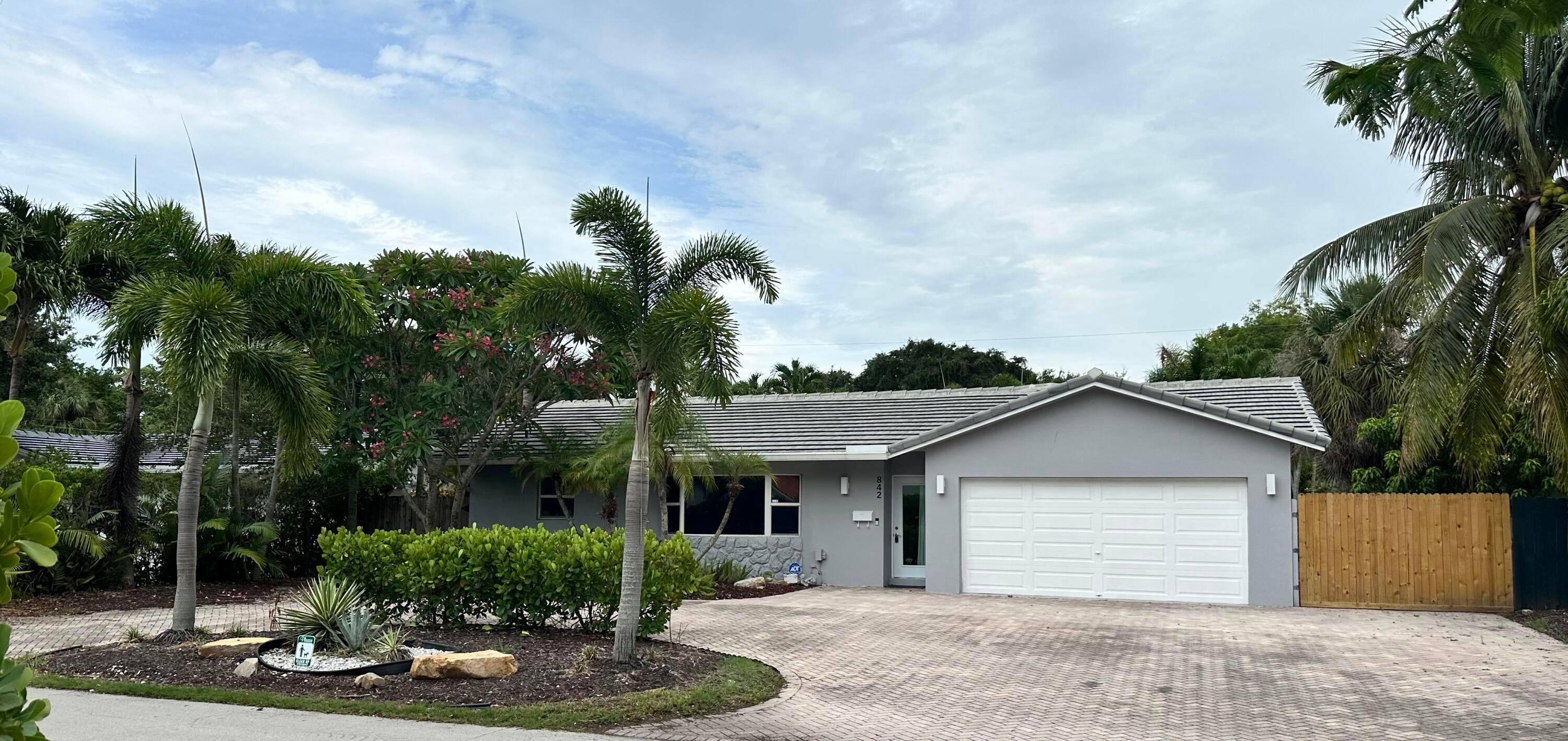 4BR 2BA pool home with spacious open floor plan in a desirable Boca Raton neighborhood with no HOA !