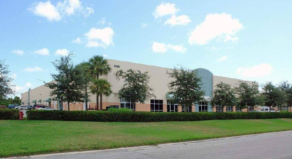 Great double unit 129 130 warehouse space with finished office and bath on ground floor, and additional office space on mezzanine level.