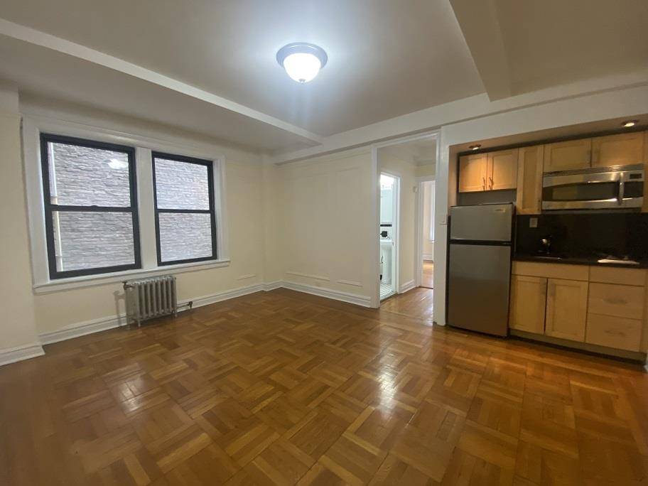 Light and bright oversized one bedroom in pre or elevator building in primary Murray Hill location.