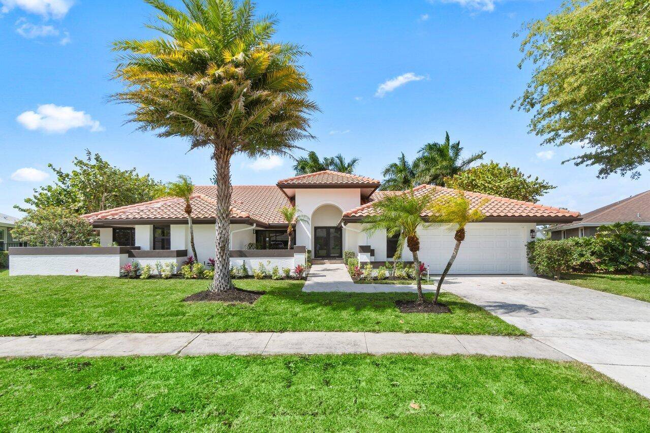 This beautifully remodeled Wellington home has it all !