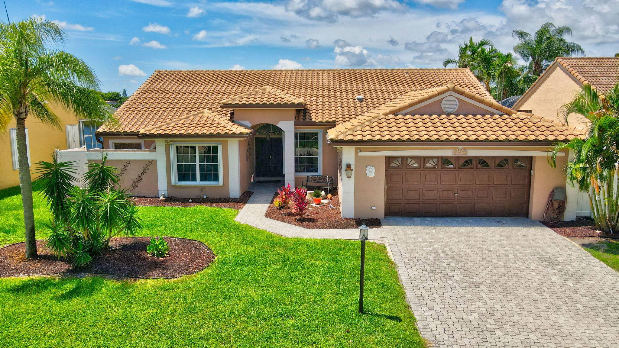 Largest one story home in Prestigious Boca Vista estates featuring 4 bedrooms plus bonus room 8x12 off master bedroom.