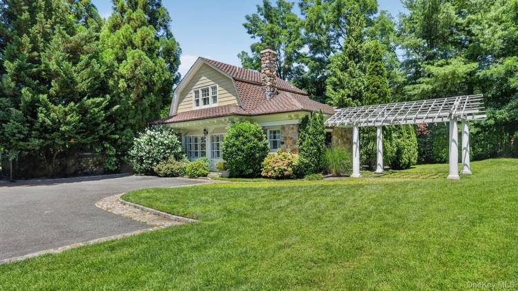 Welcome to this beautifully restored fieldstone carriage house in the prestigious Village of Plandome, offering 2 bedrooms, 2 baths, and a perfect blend of historic charm and modern comfort.