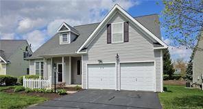 Located in a desirable 55 active adult neighborhood in East Hartford, 79 Phillips Farm Rd is a stunning single family home that boasts both elegance and functionality.