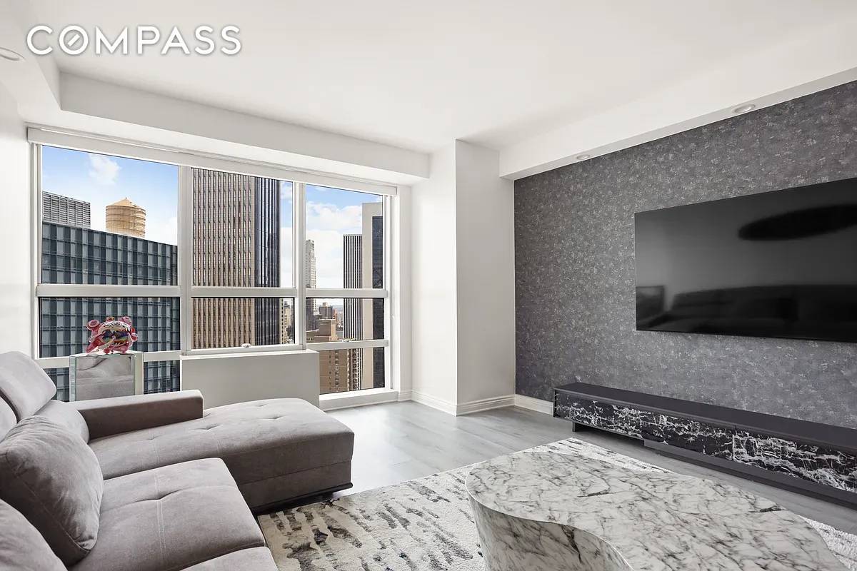 Welcome to Unit 47B, an exceptional residence in the prestigious Metropolitan Tower Condominium.