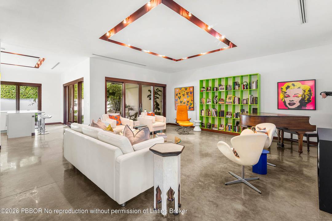 A true hidden gem and an unexpected surprise this exceptional residence lives like a private home in the heart of Palm Beach.