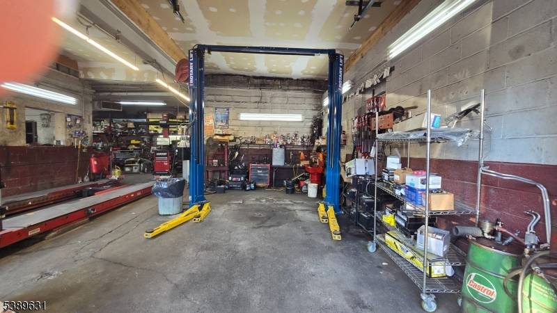 Turn key automotive repair business and property offering mechanic services, auto sales, and a DMV state inspection facility, with a NJ auto dealer license currently lapsed but renewable.