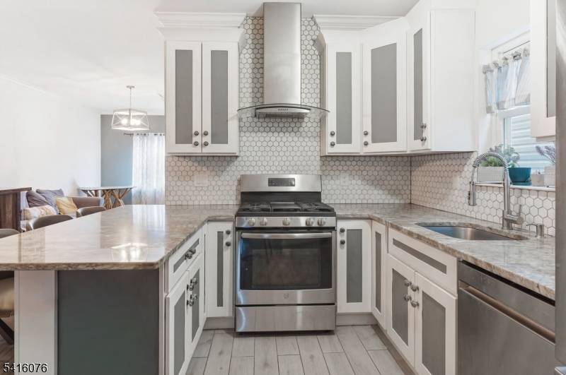 Newer built semi custom two family located in a desirable section of Elizabeth.