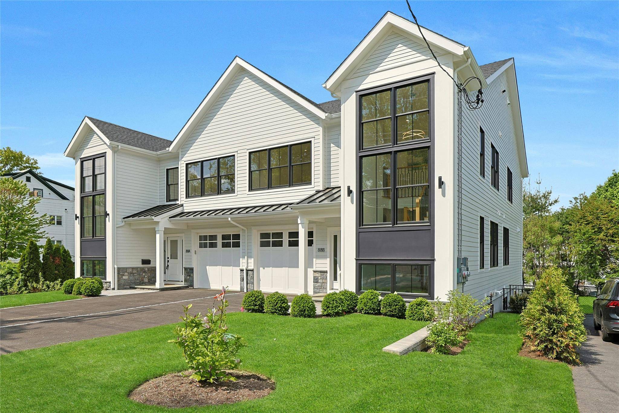 ENJOY THE SINGLE FAMILY LIFESTYLE IN THIS BRAND NEW TOWNHOME WITH LOW TAXES IN THE HEART OF RYE !