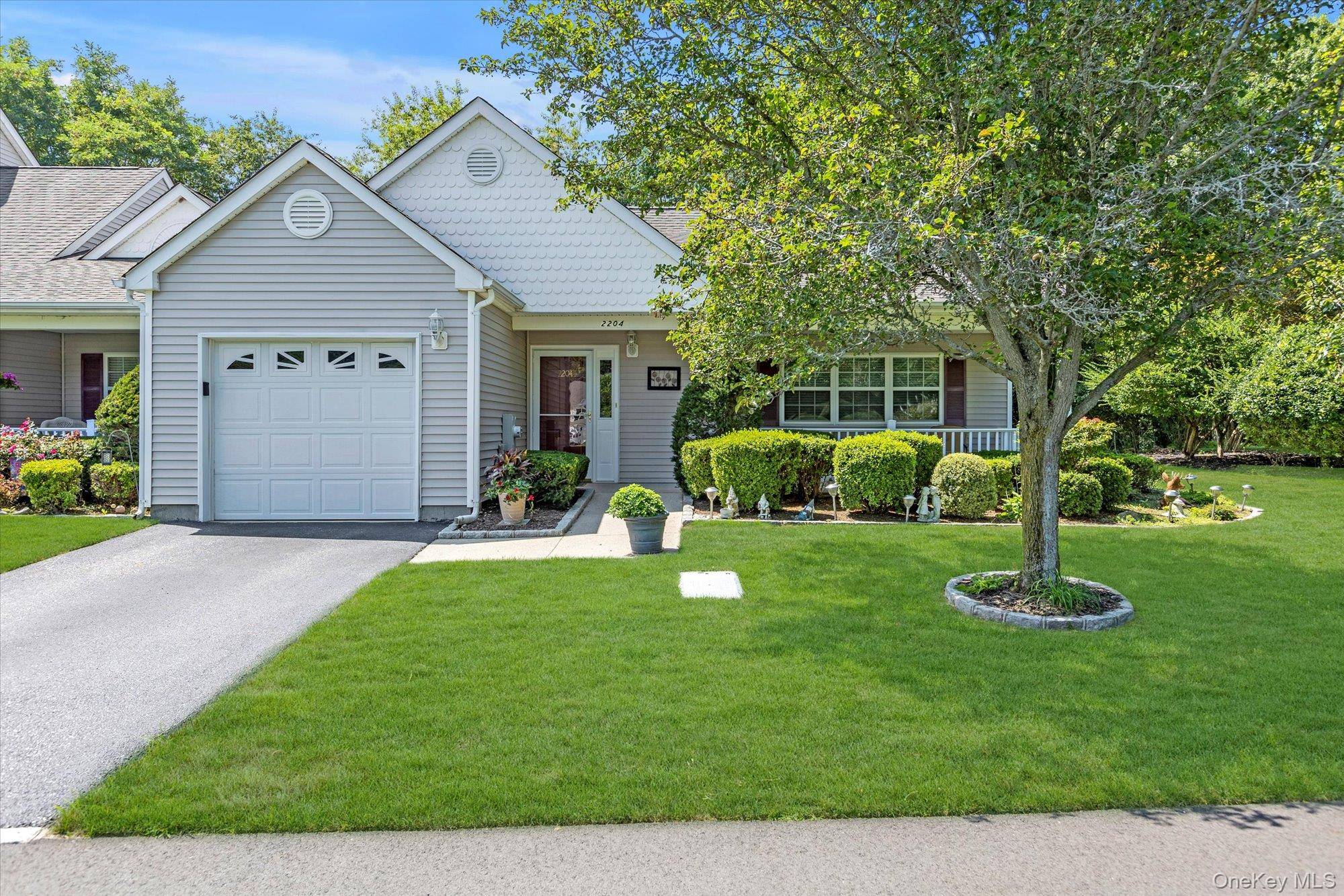Welcome Home ! This much sought after AUGUSTA model in an end unit in desirable Sunken Pond Estates, a 55 gated community.