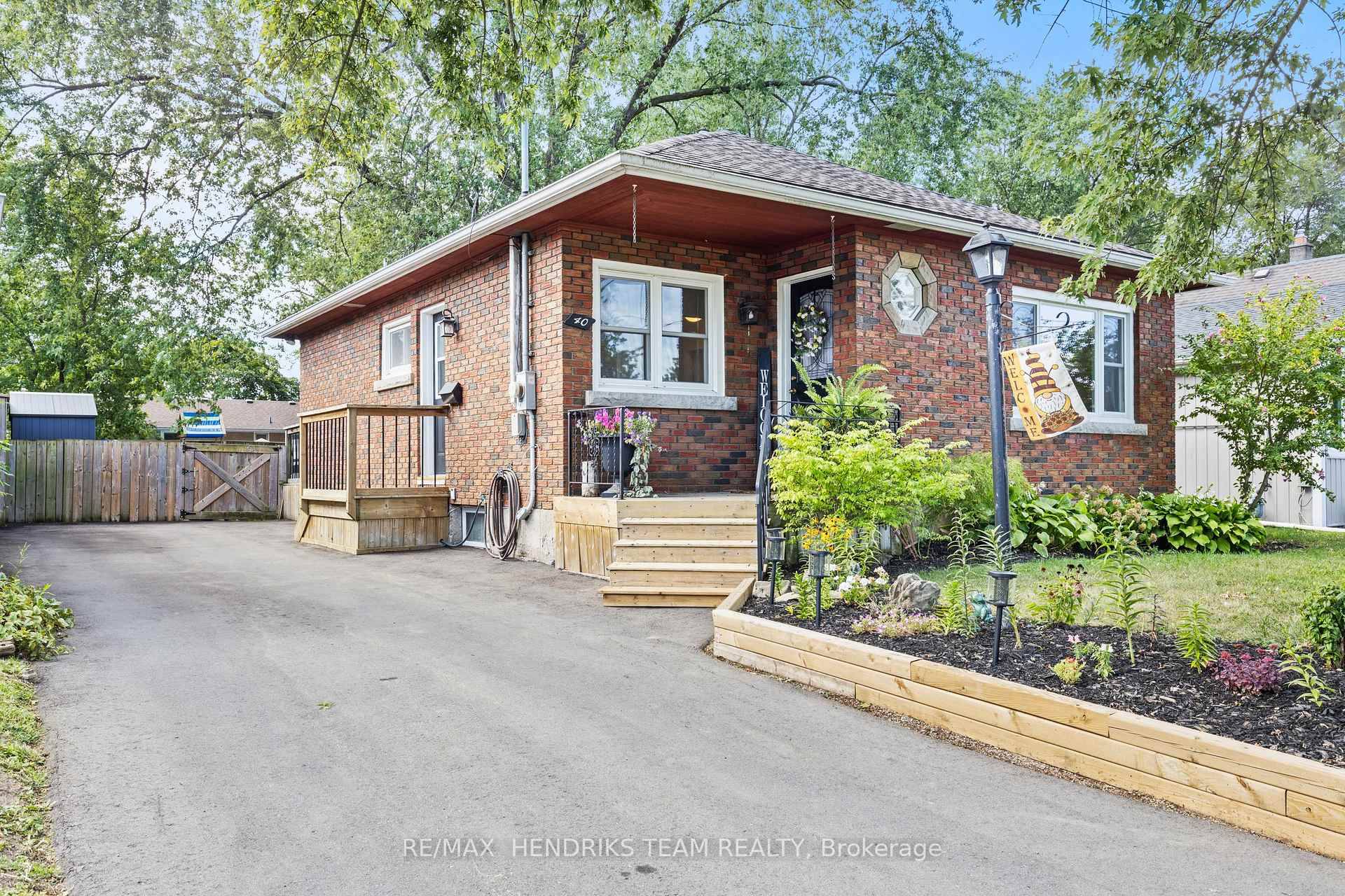 Solid brick bungalow in the heart of Secord Woods.