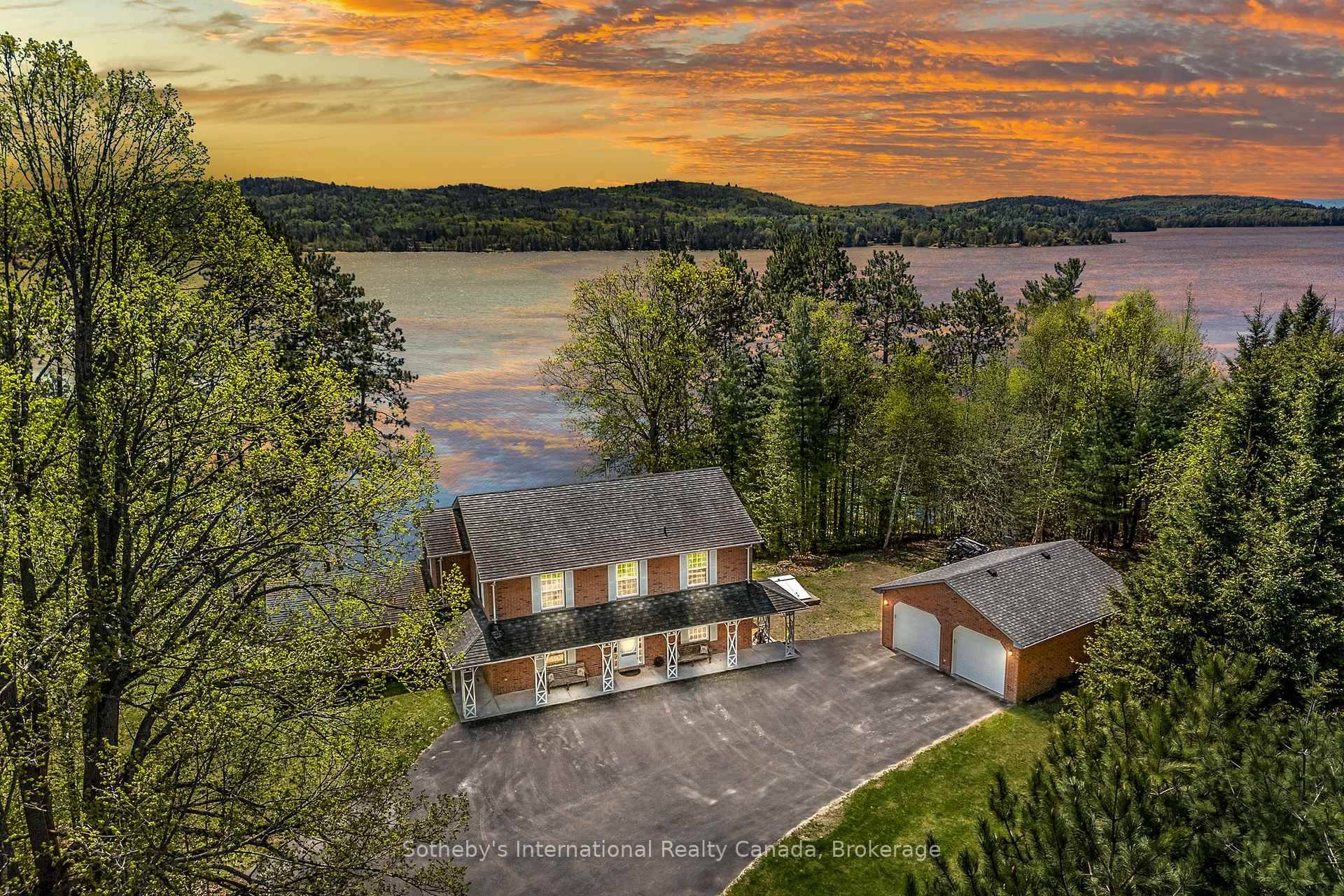 Positioned on a private peninsula with nearly 1, 100 feet of pristine shoreline and just under 3 acres of land, this executive lakeside retreat offers a rare combination of seclusion, ...