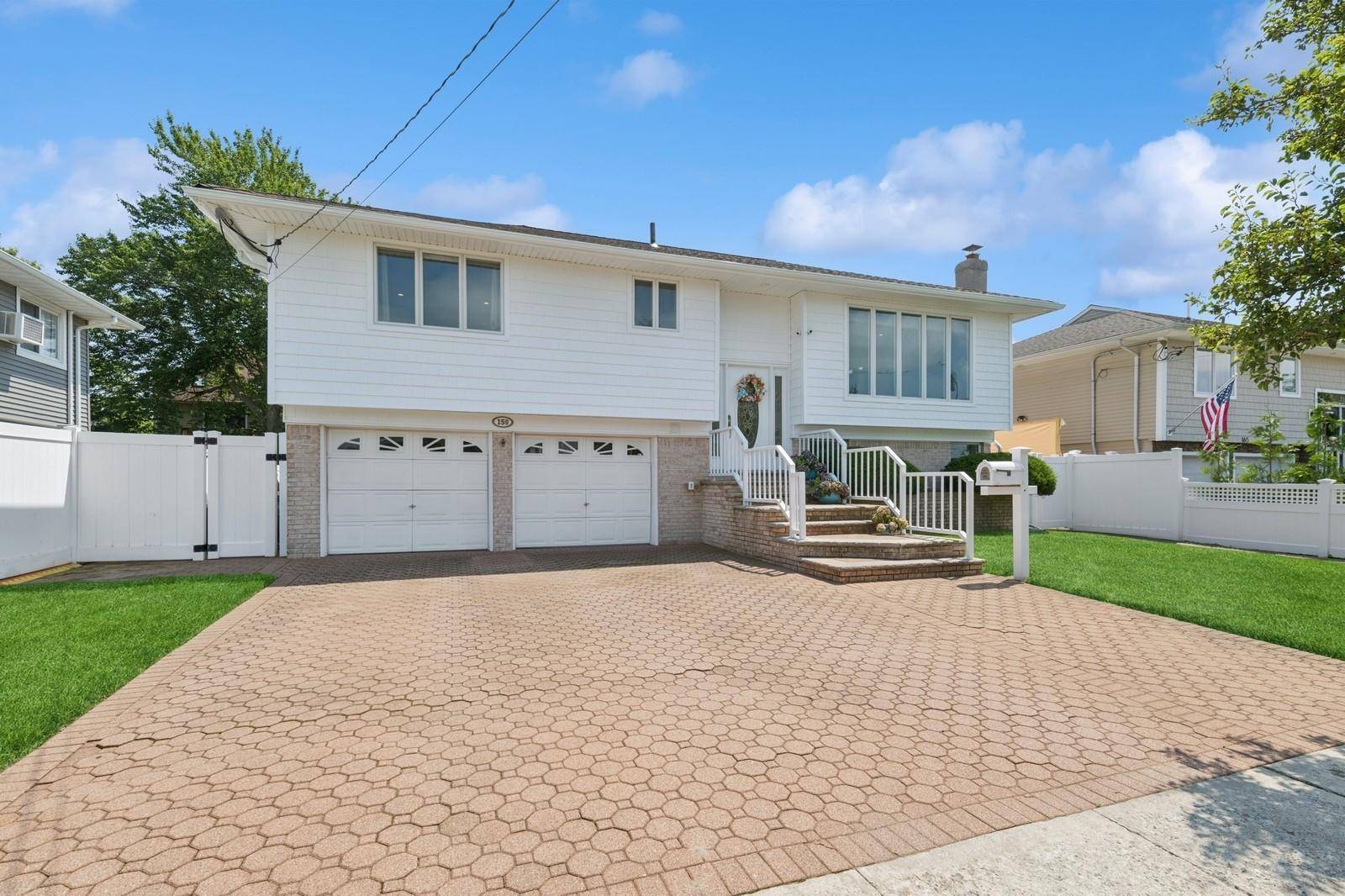 WELCOME HOME TO THIS BEAUTIFULLY RENOVATED amp ; METICULOUSLY MAINTAINED FOUR BEDROOMS, TWO BATHROOMS WIDE LINE HI RANCH WITH PRIVATE PARK LIKE BACKYARD, 7 LOW TAXES !