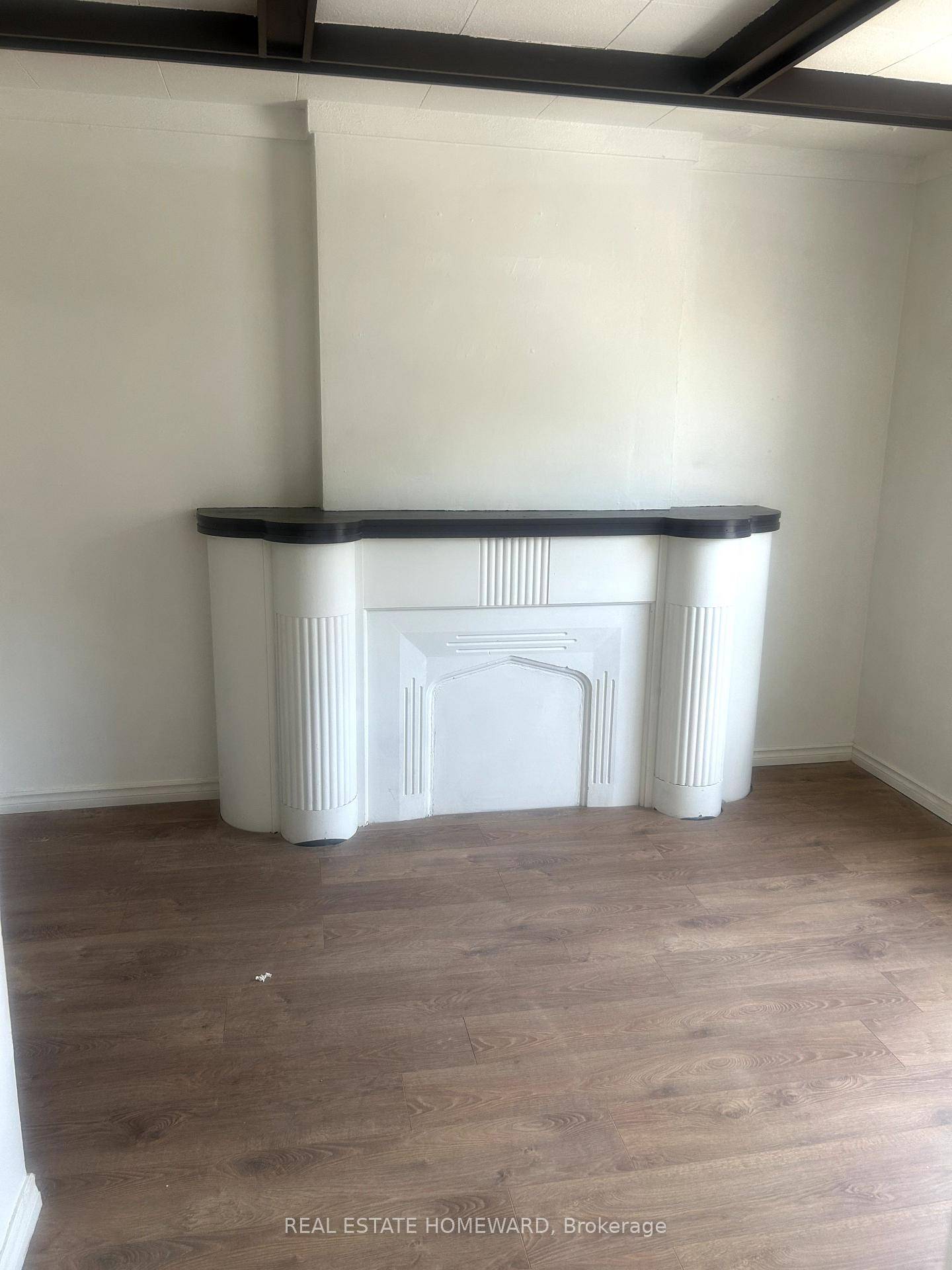 Spacious 2 bedroom, above a store in heart of Gerrard E.