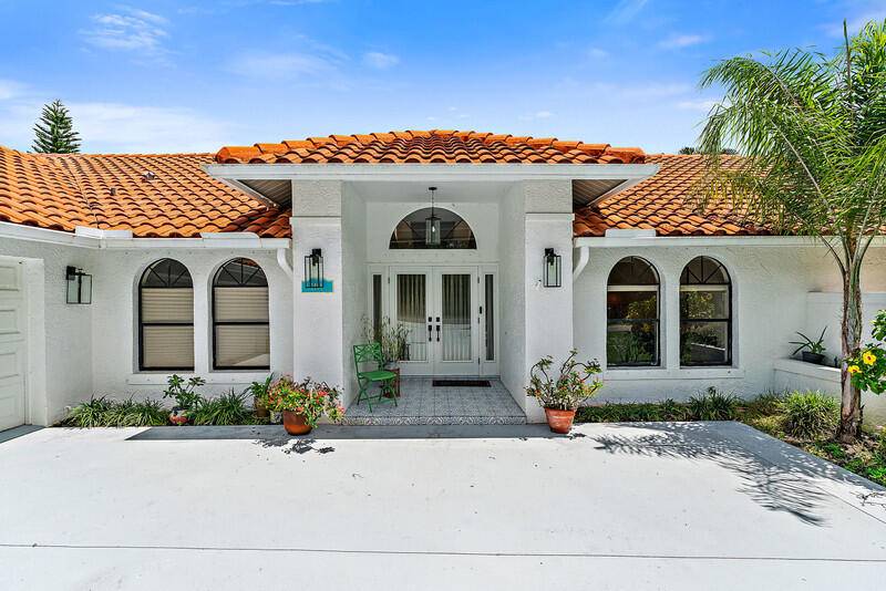 This South Florida retreat is a perfect seasonal or primary home.