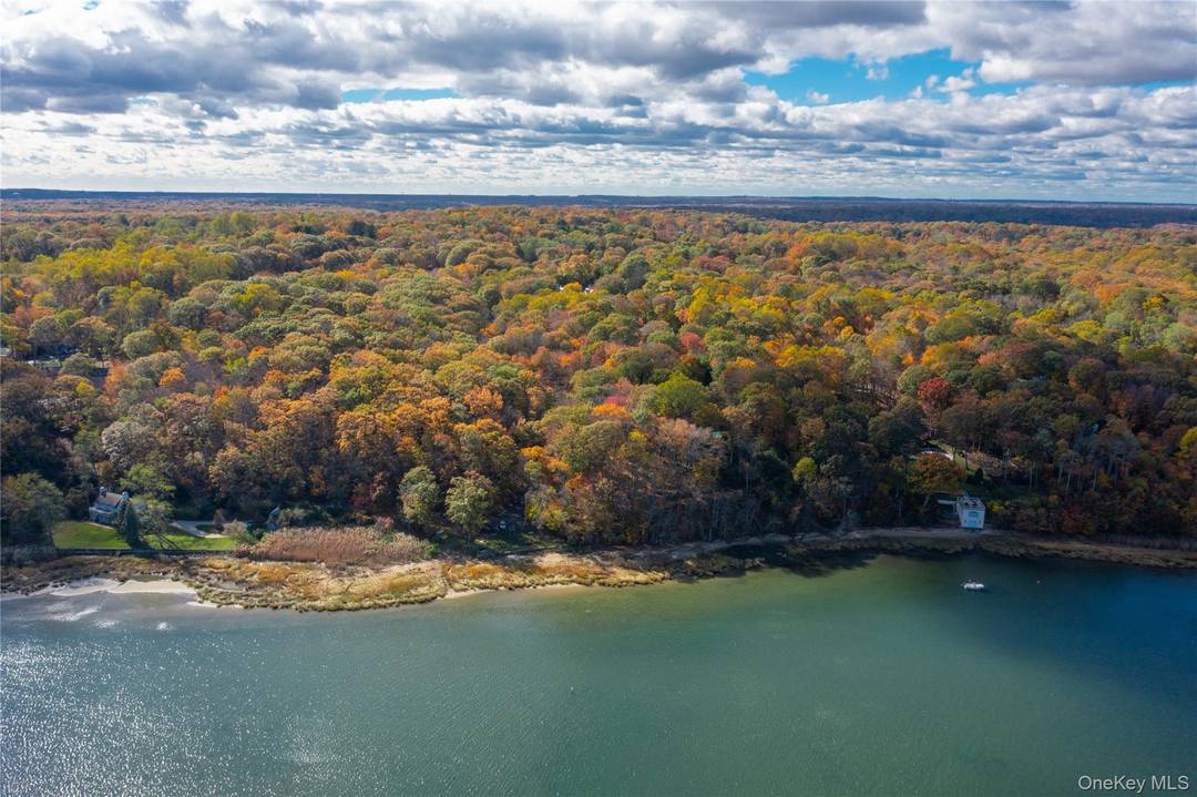 A rare opportunity in Head of the Harbor over 4 acres of subdivided land offering unmatched potential and panoramic water views.