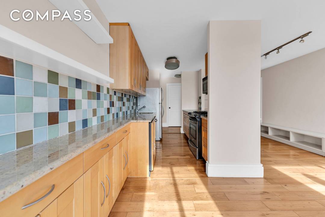 Corner Unit With River Views !