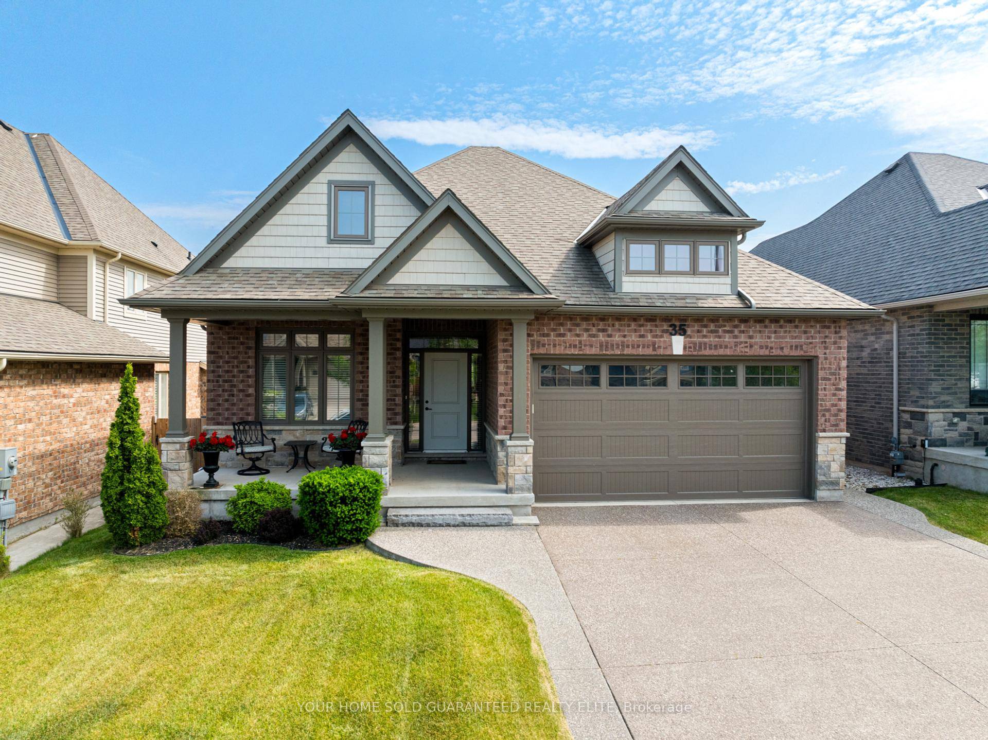 MODERN BUNGALOW BACKING ONTO TRANQUIL GREEN SPACE WITH WALKOUT BASEMENT WITH ALL FURNITURE INCLUDED !