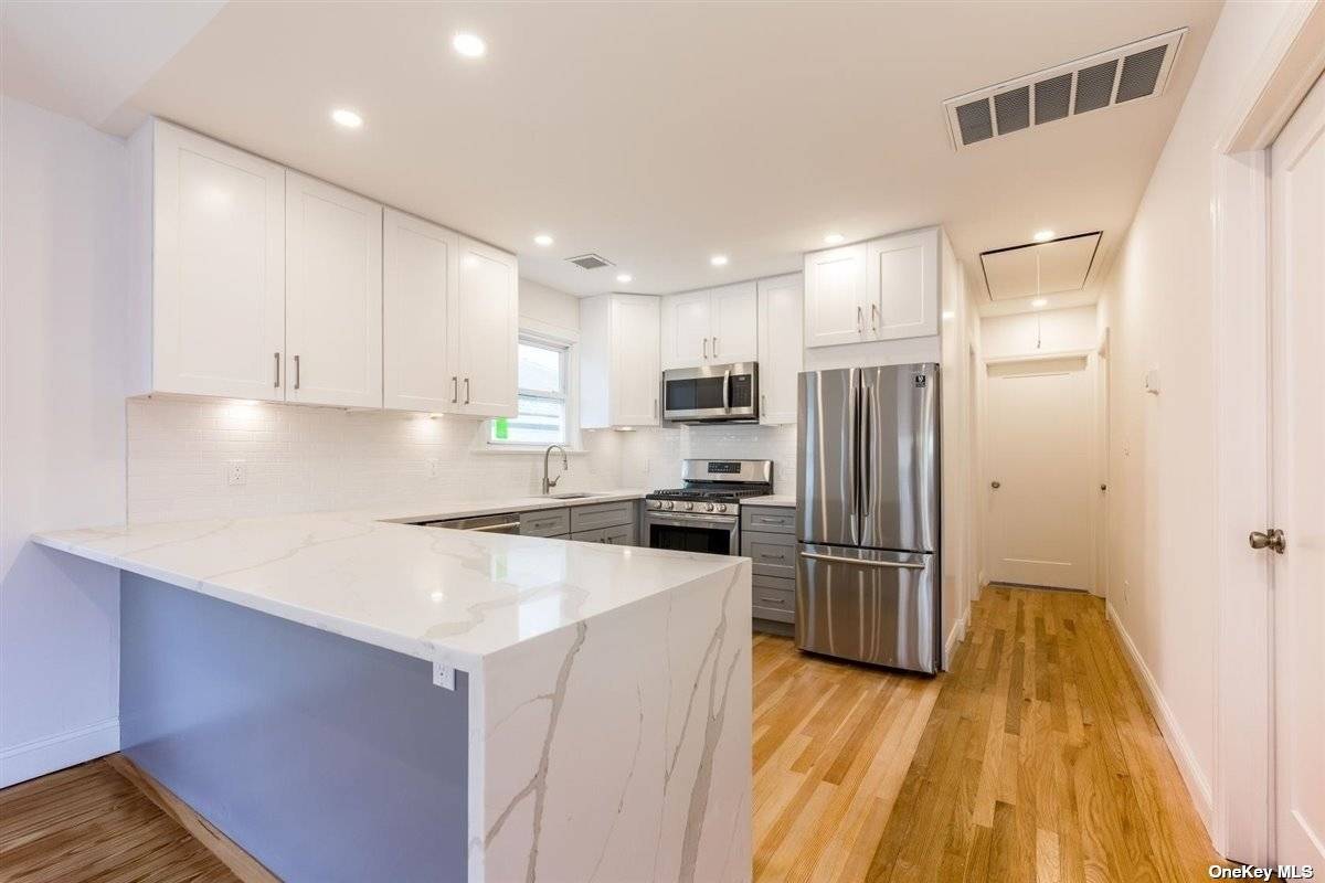 Step inside this newly renovated 3 bedroom, 2 bath, finished lower floor, in East Atlantic Beach.