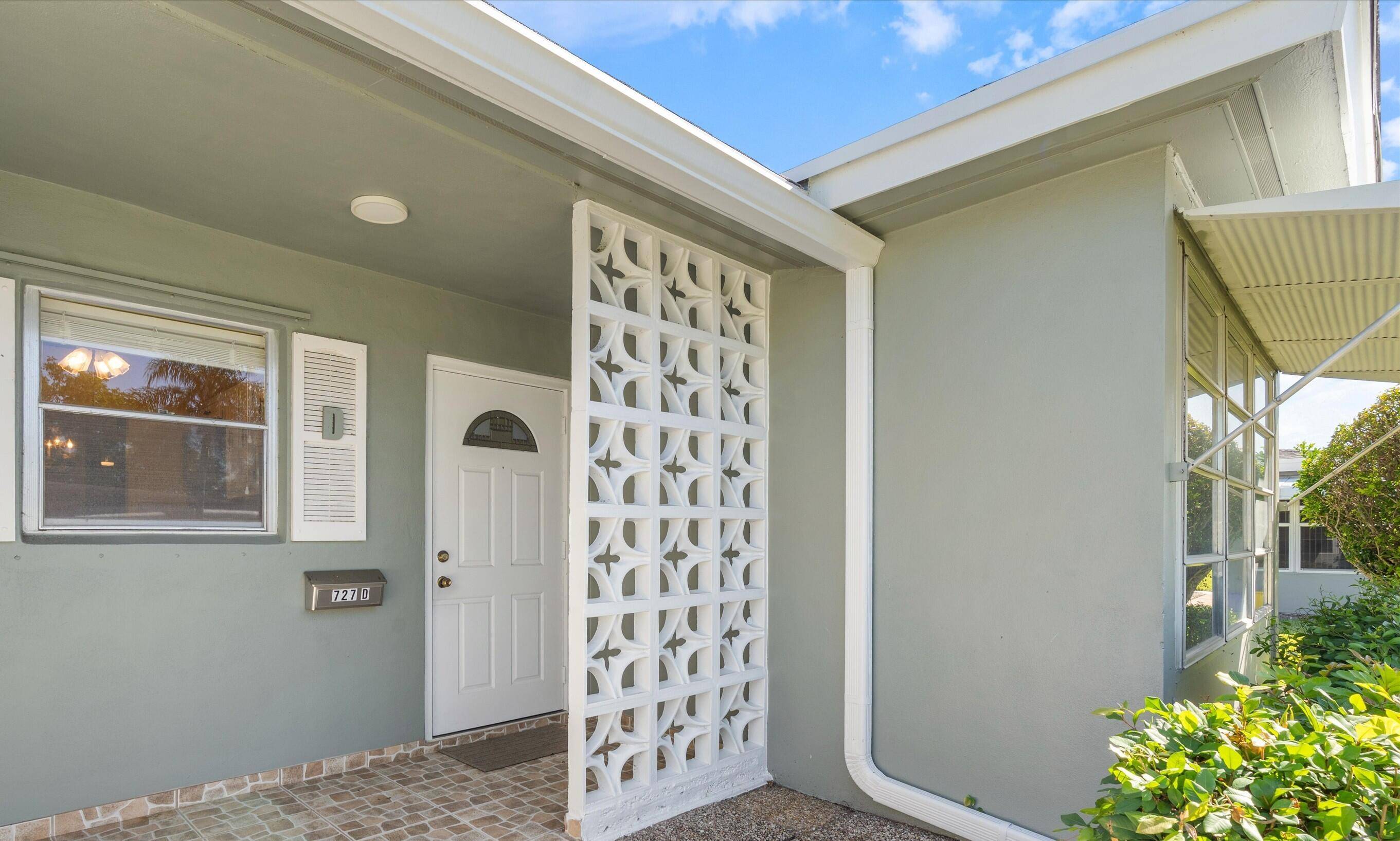 Experience this inviting 2 2 corner unit villa in the highly sought after Section Three !