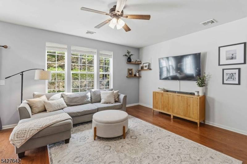 Located in the highly sought after Waterview community, this beautifully maintained, like new multi level townhome is set in one of the best locations within the complex.