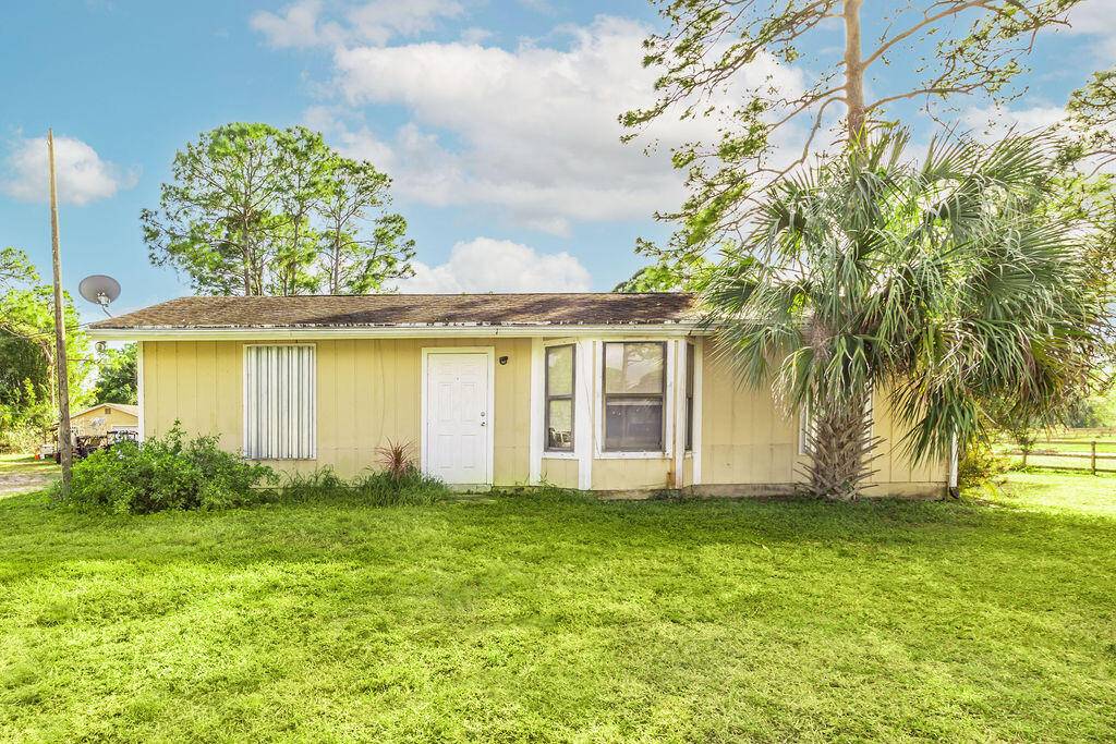 Spacious 3 bedroom, 2 bath single family home with a detached 32' x 24' garage, easily converted to a mother in Law suite as it has its own electric meter ...