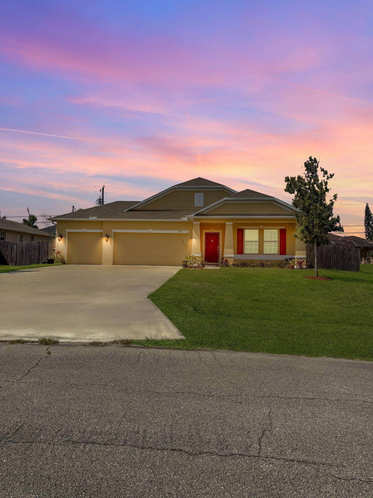 You'll feel right at home when walking into this 4 bedroom 2 bath home with great room, den AND 3 car garage.