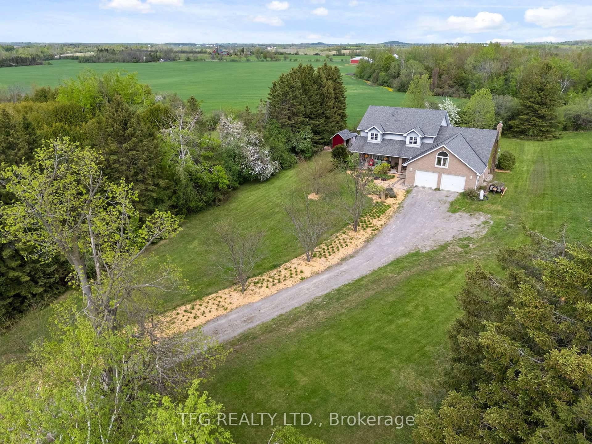 Set back at the end of a long winding driveway atop a hill sits this expansive family home w incredible views on 1.