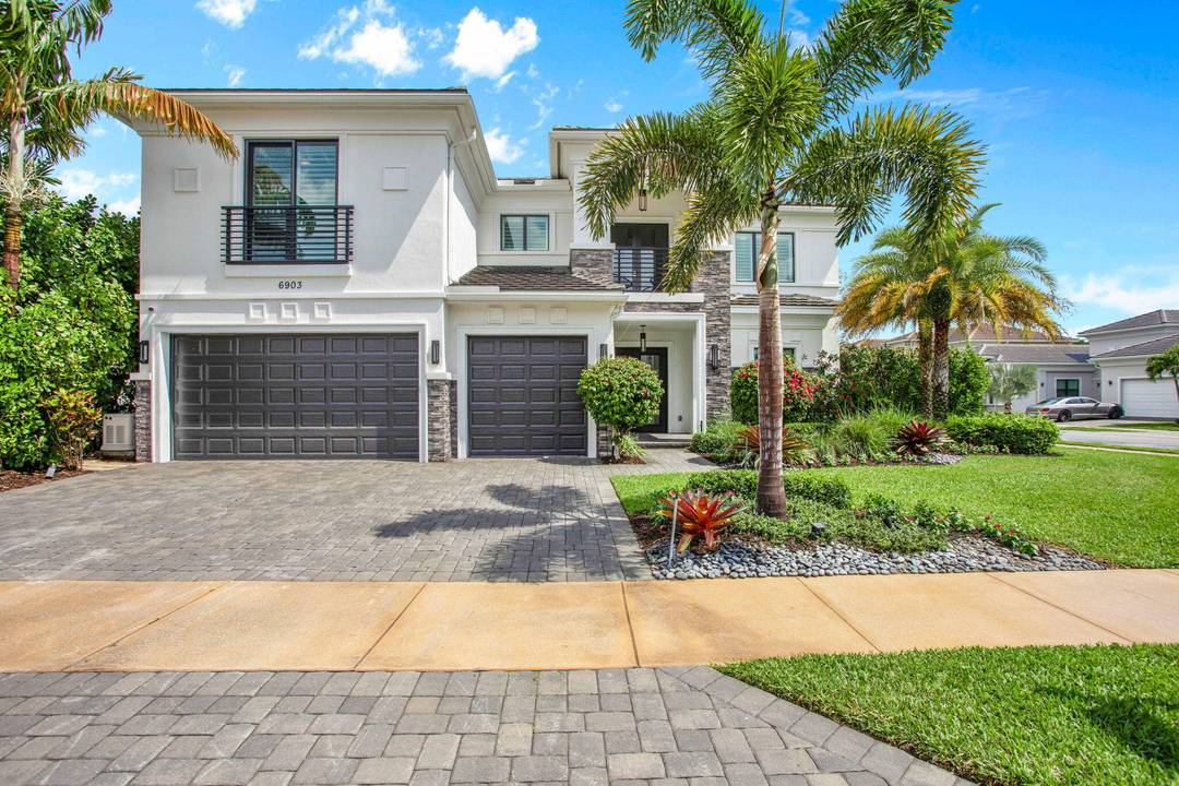 This Callahan model in Royal Palm Polo offers resort style living on a corner lot w a side yard and lots of privacy.
