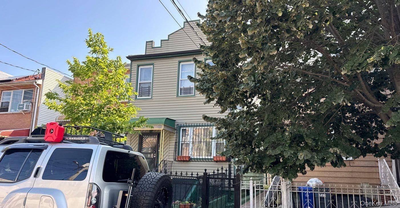 This Duplex Style Home Features 5 Bedrooms, 2 Full Baths, 2 Eat In Kitchens and Basement.