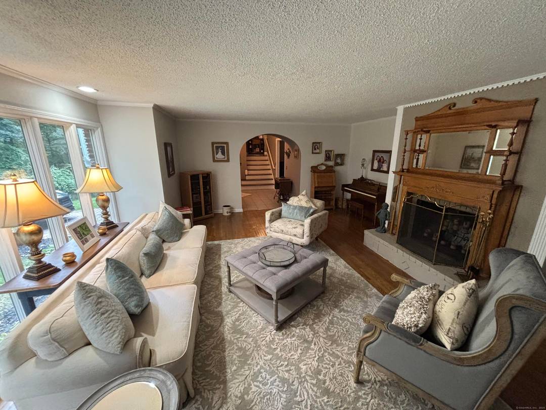 Discover your tranquil retreat at 80 Pine Hollow Drive !