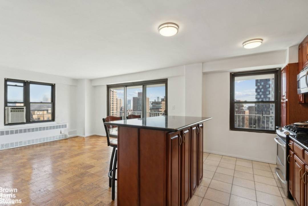 This spacious one bedroom features a full length terrace, sun drenched southwestern exposure, and dramatic views !