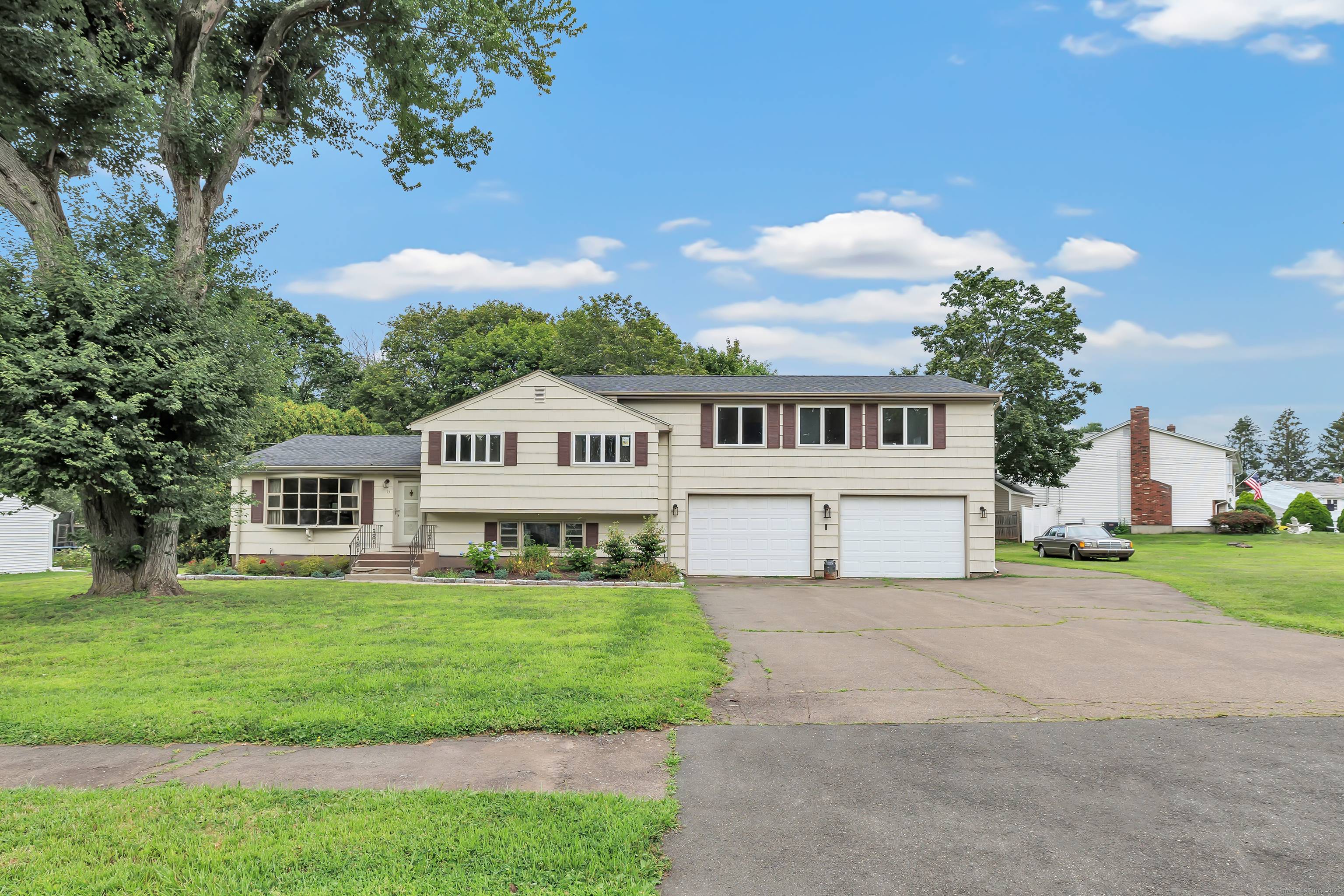 Welcome to this generously sized 4 bedroom split level home, perfectly nestled in a quiet residential neighborhood just minutes from shopping, recreation, and entertainment.