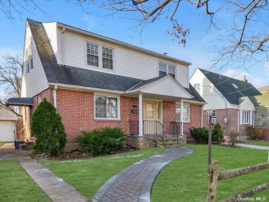 Nestled in the highly sought after neighborhood of New Hyde Park, this charming Dormered Cape style home presents a fantastic opportunity.