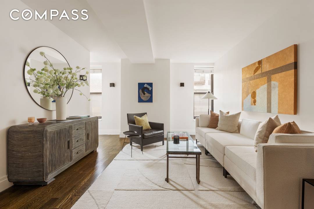 Upgraded and move in ready, this convertible two bedroom, two bathroom residence at The Fitzgerald blends timeless prewar character with thoughtfully curated modern enhancements.
