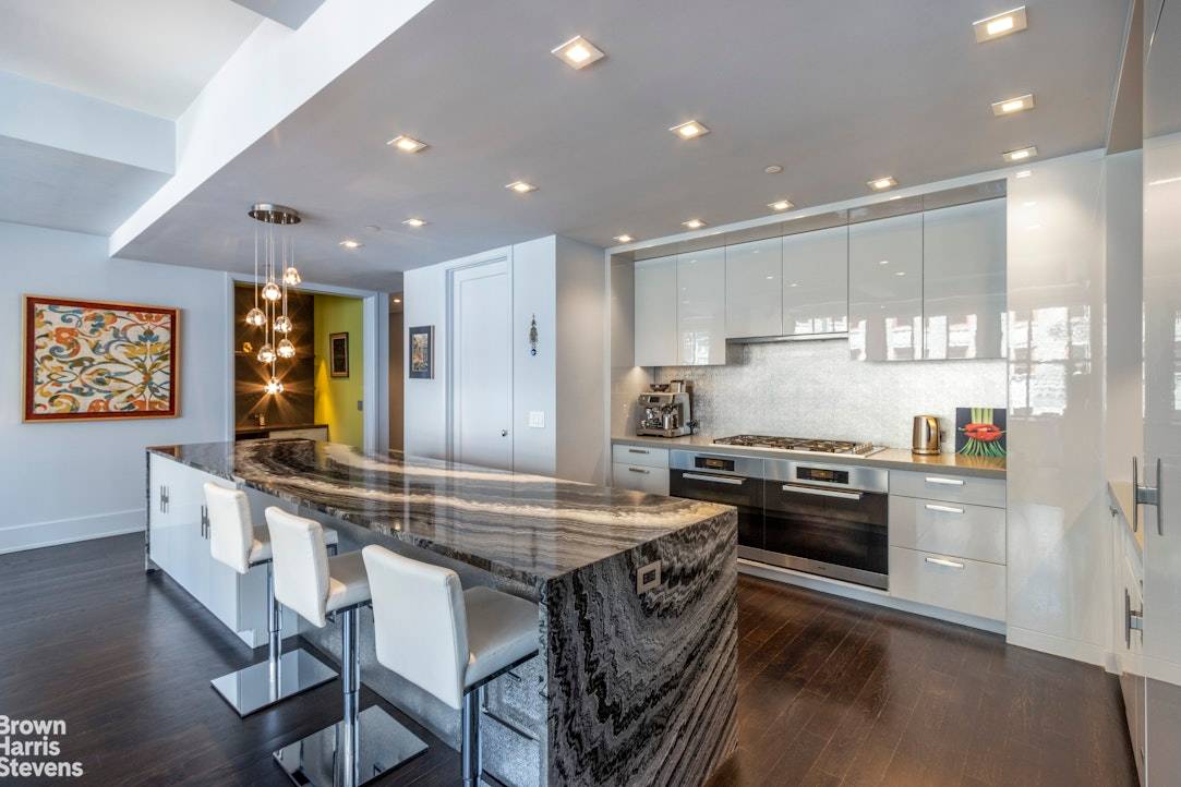 PICTURE PERFECT, CONTEMPORARY CHELSEA LOFTThis sleek, high floor condominium home is a beautifully renovated and meticulously maintained 2256 square foot, convertible three bedroom, 2.