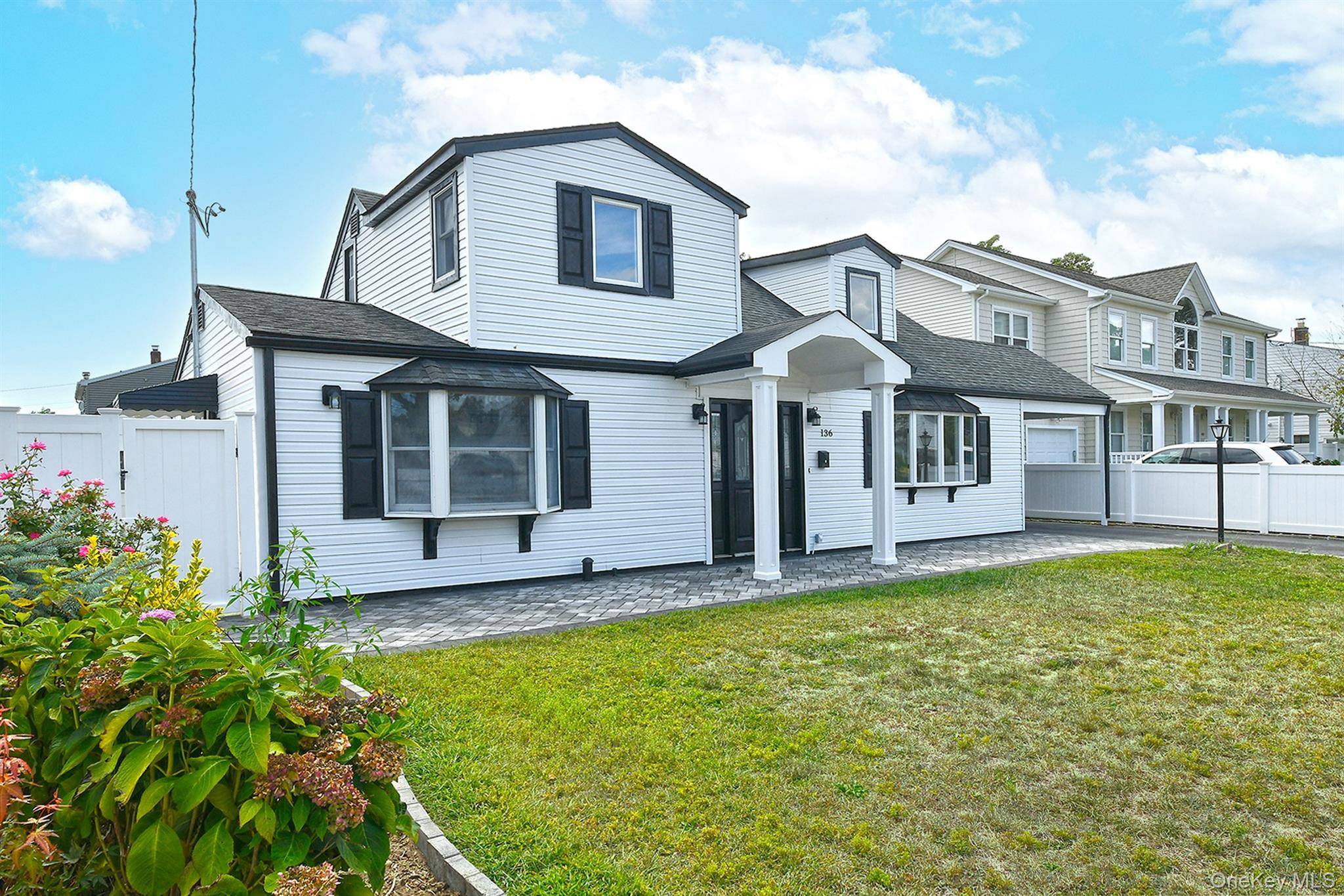 Completely renovated two story home with sleek, modern style and incredible curb appeal.