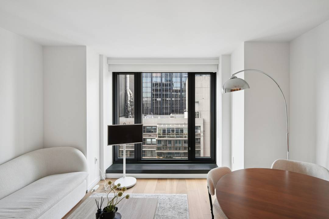 Set high above Midtown, Residence 34E at 111 West 56th Street pairs striking skyline views with the refined, detail driven design of Thomas Juul Hansen.