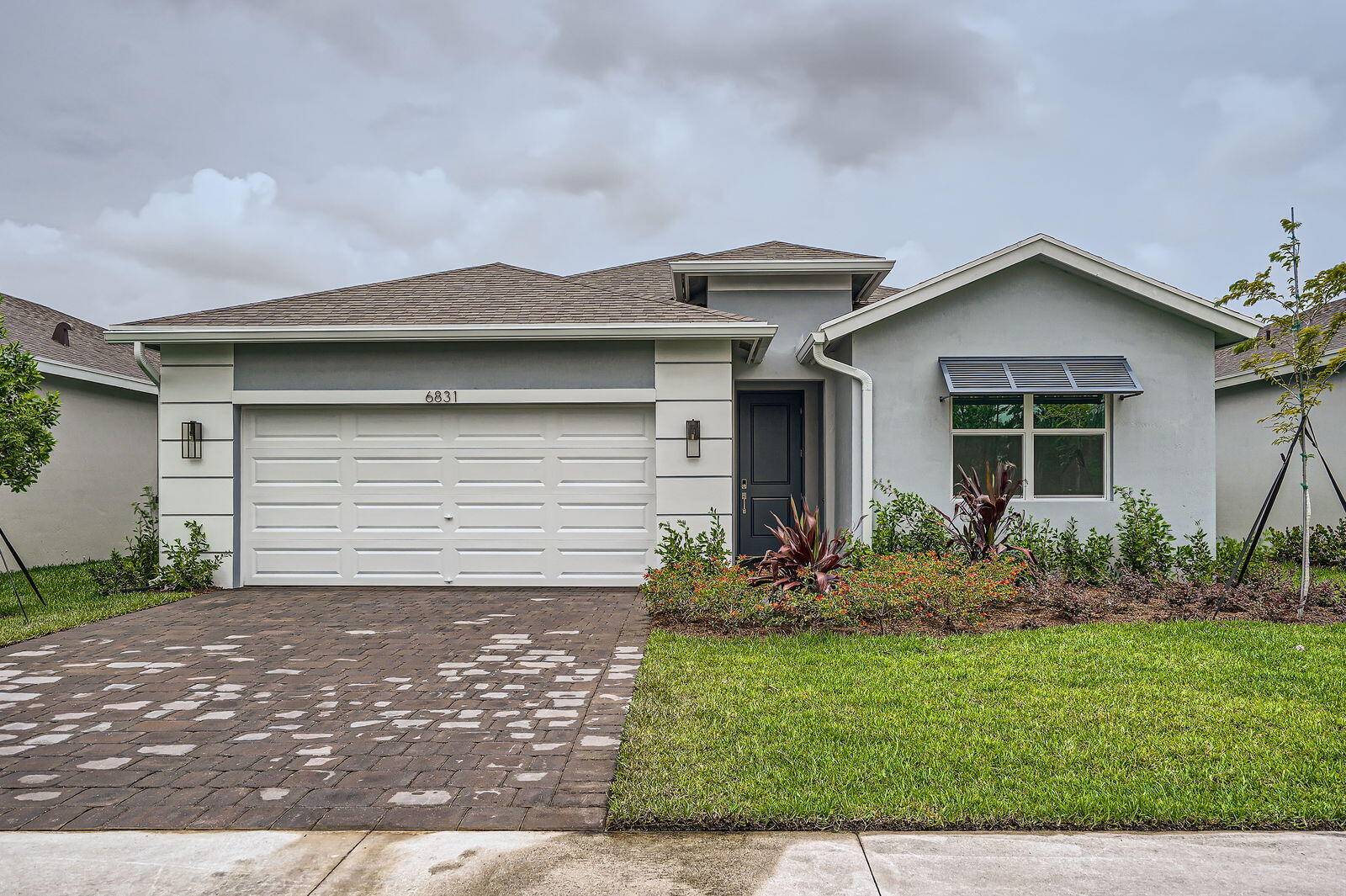The Delaney floor plan is a single story, single family home with 2, 034 square feet of living space featured in our Preserves at Park Trace community in Stuart, Florida.