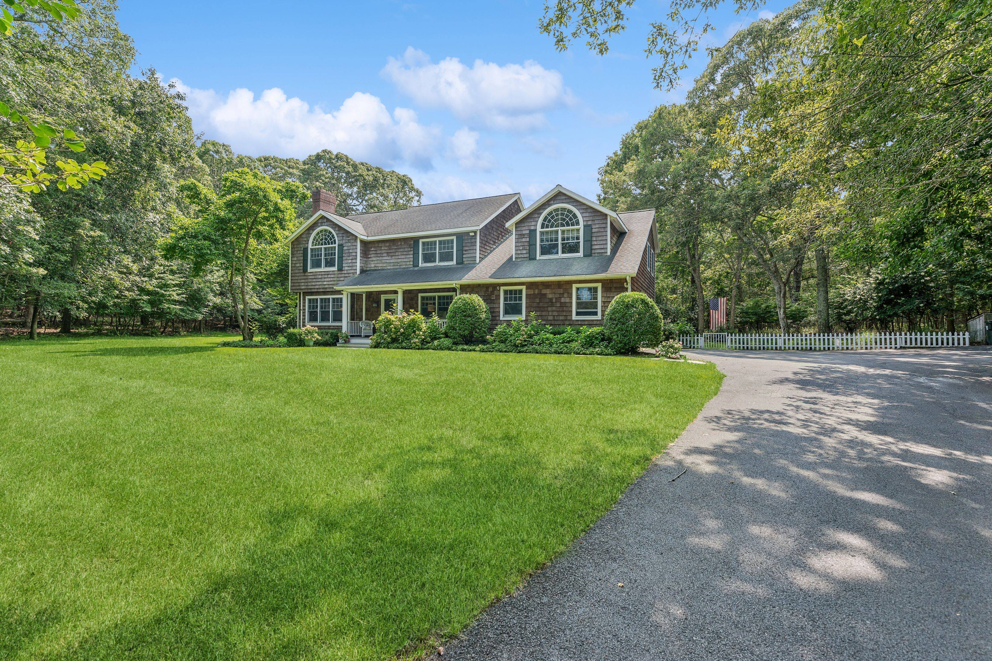 This beautiful, spacious, four bedroom, four bath home is situated on 2.