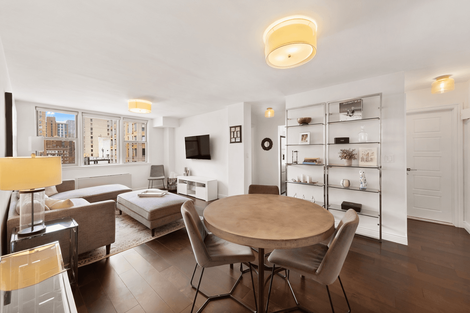 Experience city living at its finest in this beautifully renovated, 2 bedroom, 1 bathroom corner residence with sweeping open views of the Empire State Building and a glimpse of the ...