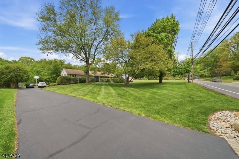 Set on a deep 1 acre lot, this well maintained 3 bedroom, 2 bath ranch offers space, flexibility, and a backyard that feels like its own retreat.