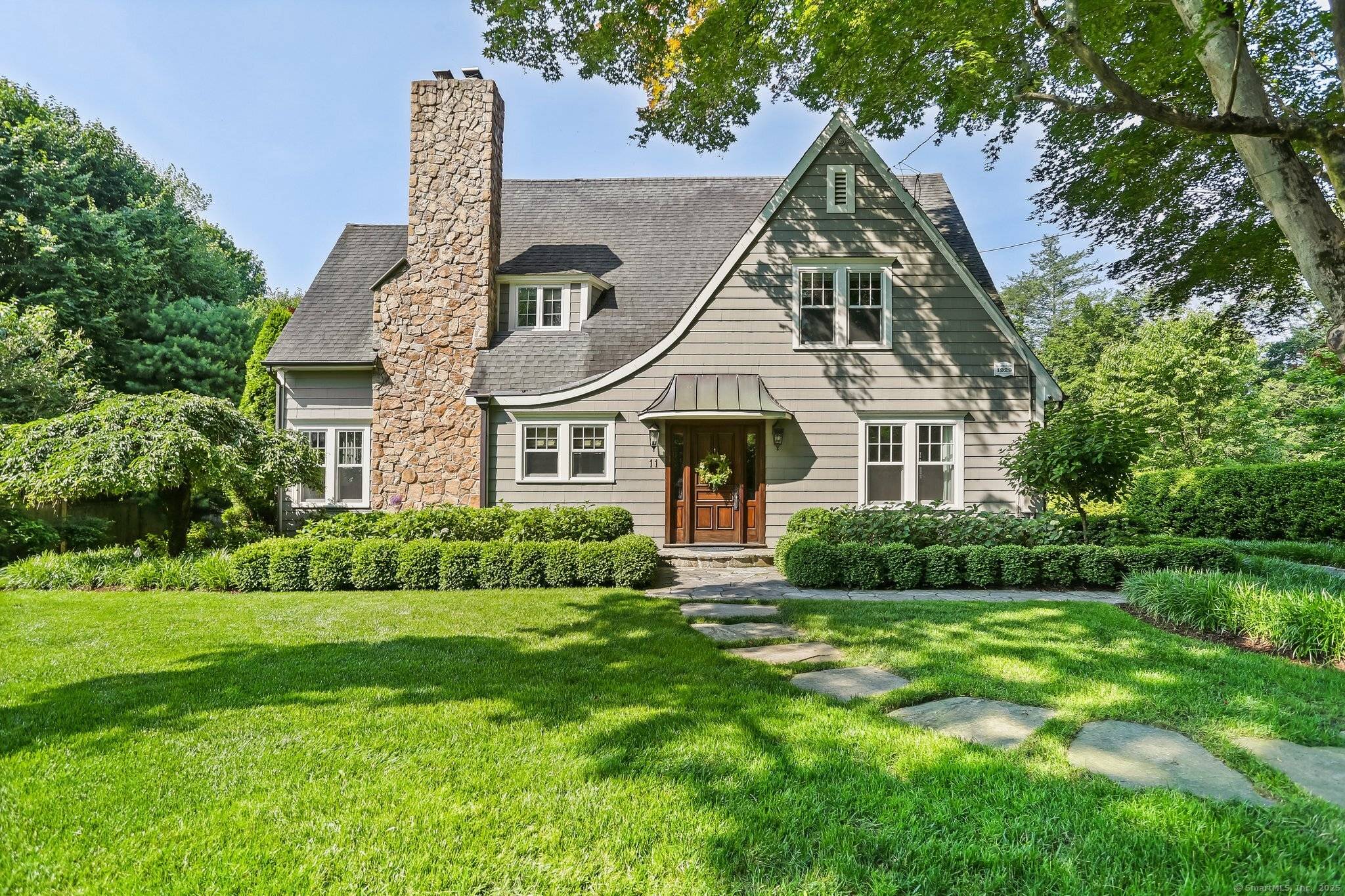 Nestled in the heart of Westport's coveted Old Hill neighborhood, this home offers the charm of an English cottage and a thoughtful design that blends classic character with the modern ...