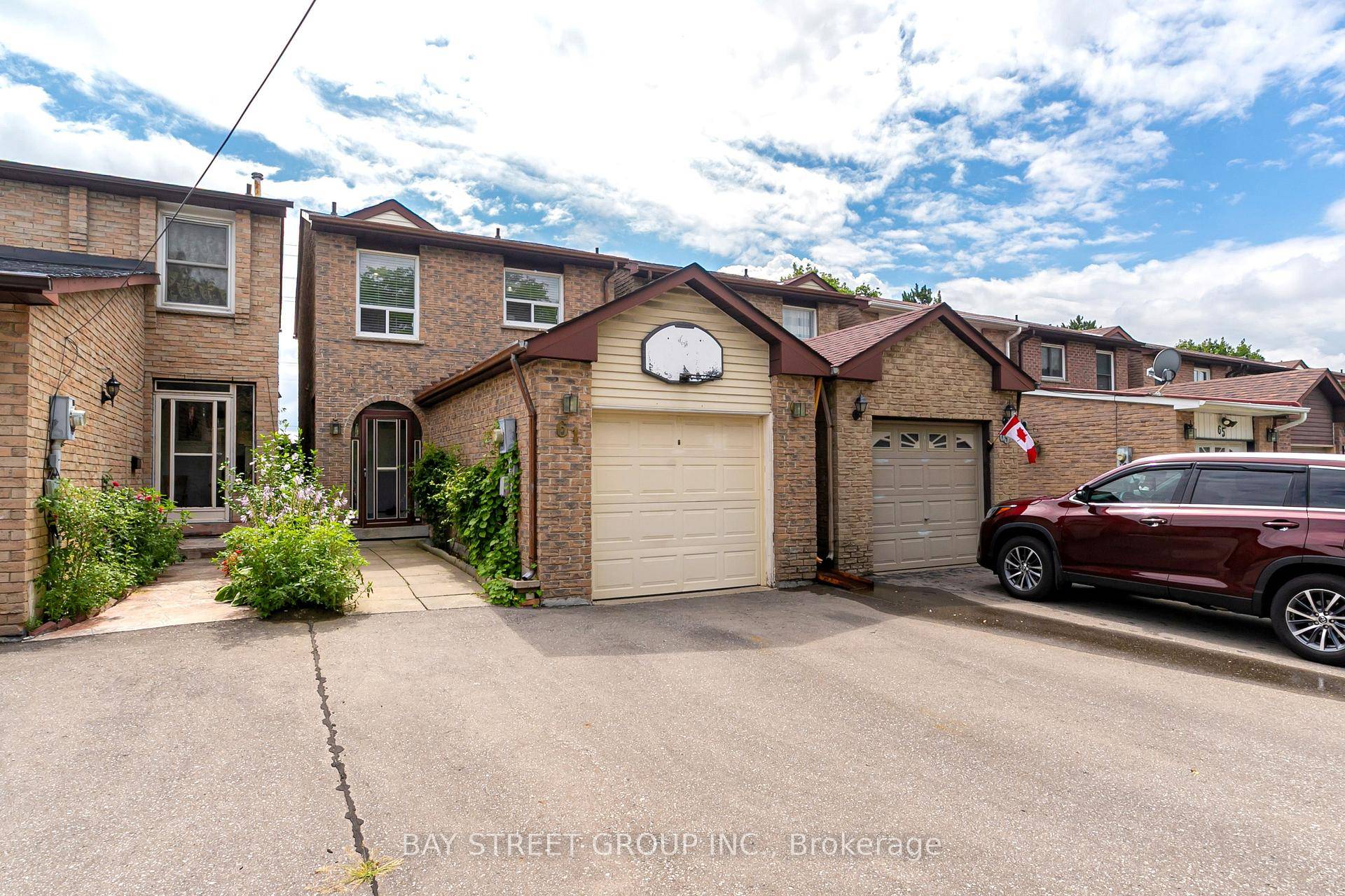 Welcome to 61 Mabley Crescent, a solid all brick Detached Link home offering the perfect combination of comfort, function, and excellent location.