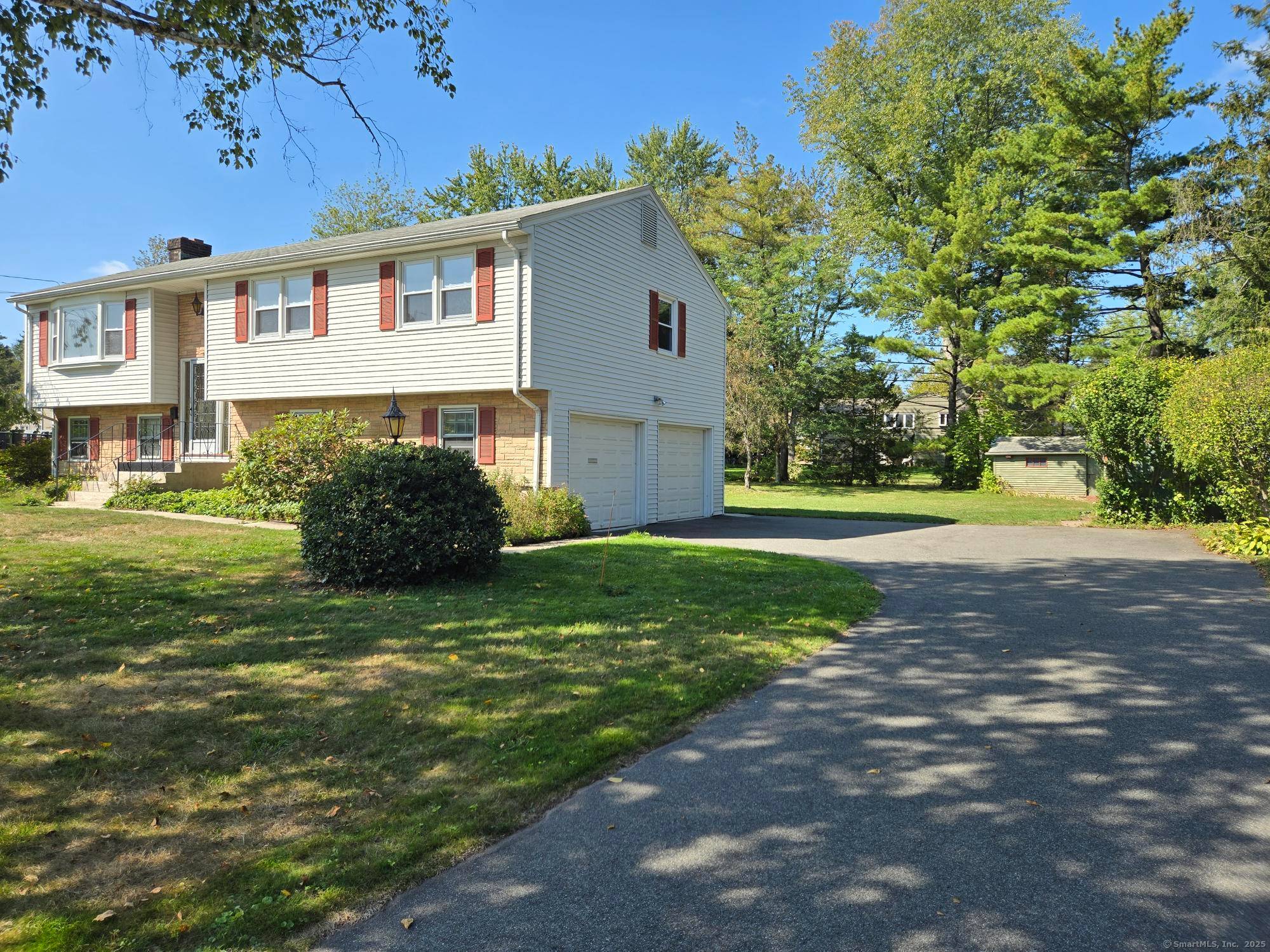 Welcome to this charming 3 bedroom Raised Ranch, perfectly situated on a peaceful street.