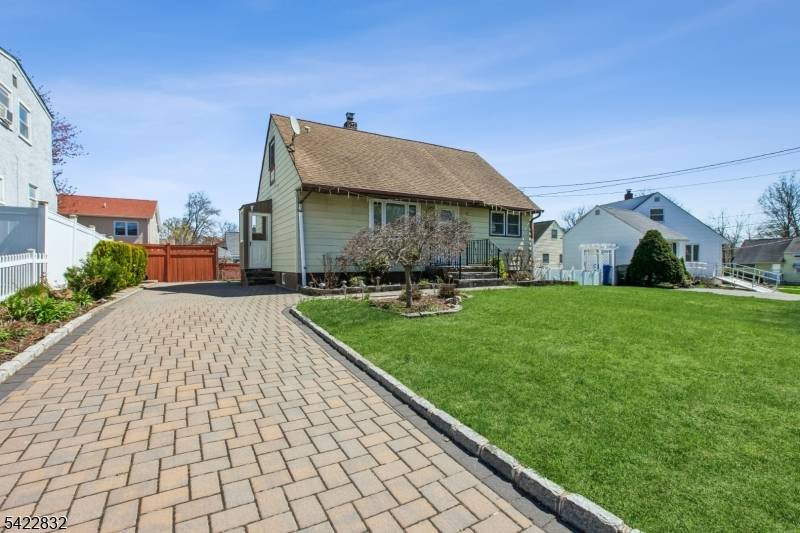 Updated and well maintained 4 bedroom, 1 bath home featuring an updated kitchen with stainless steel appliances, garbage disposal, granite countertops, a stylish backsplash, and an outside vented fan.