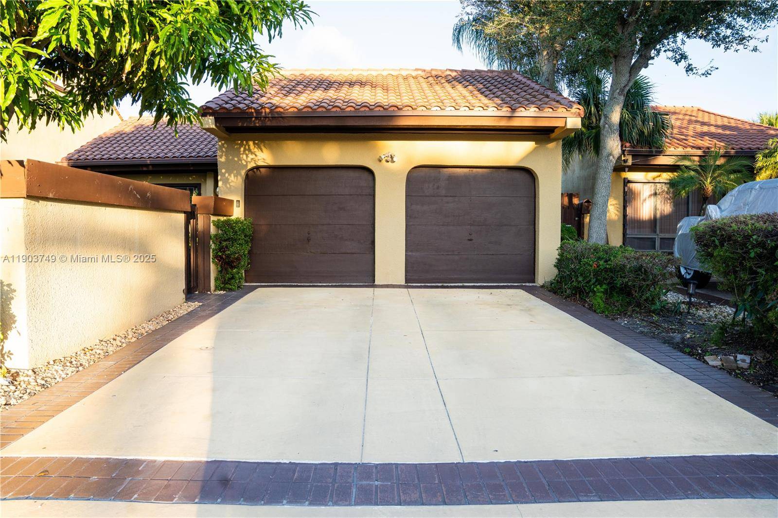 Discover a truly rare gem a move in ready oasis in a cozy, plush gated community.