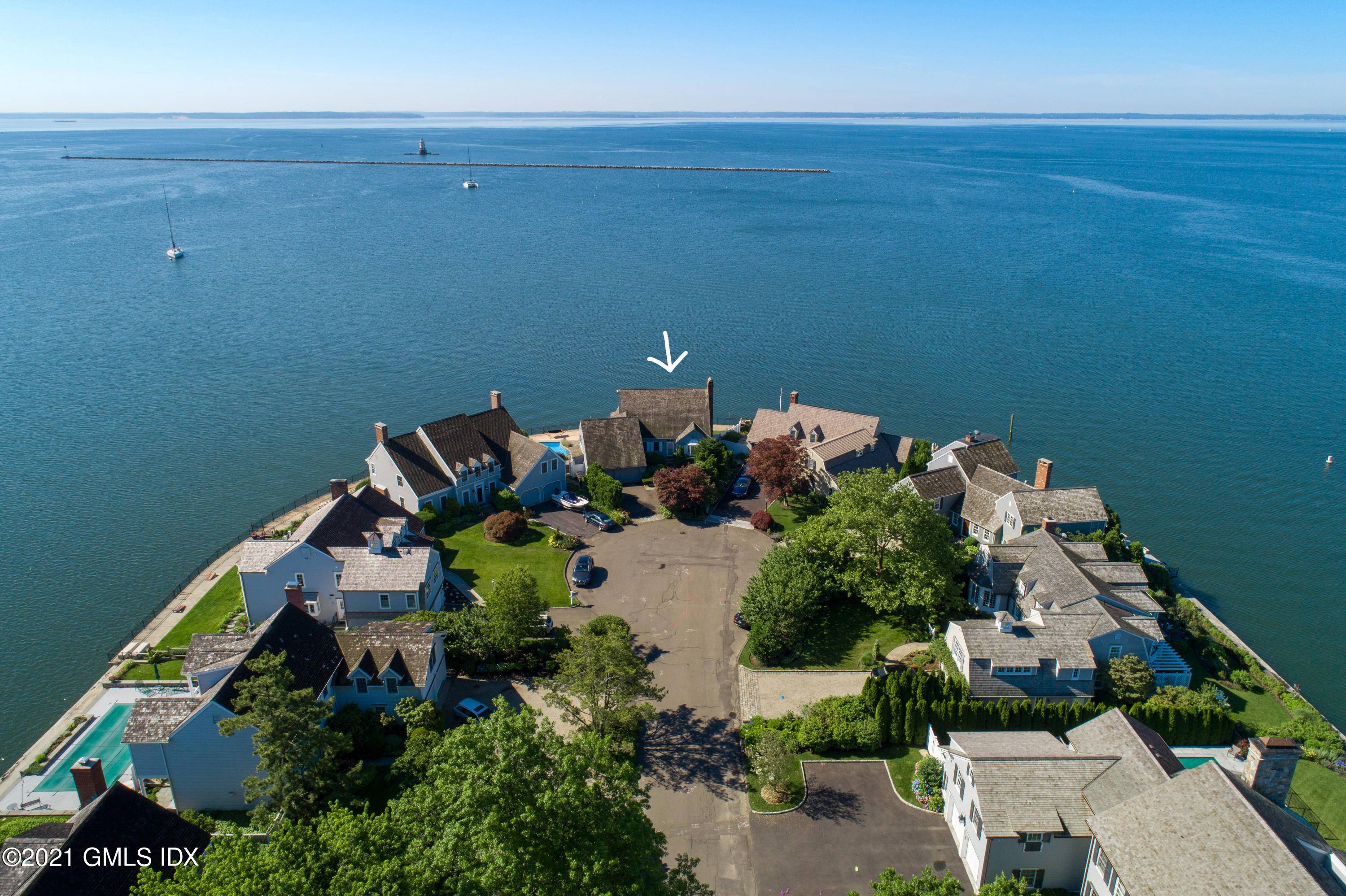 Spectacular waterfront with pool Premier site is located at the very tip of Dolphin Cove peninsula.