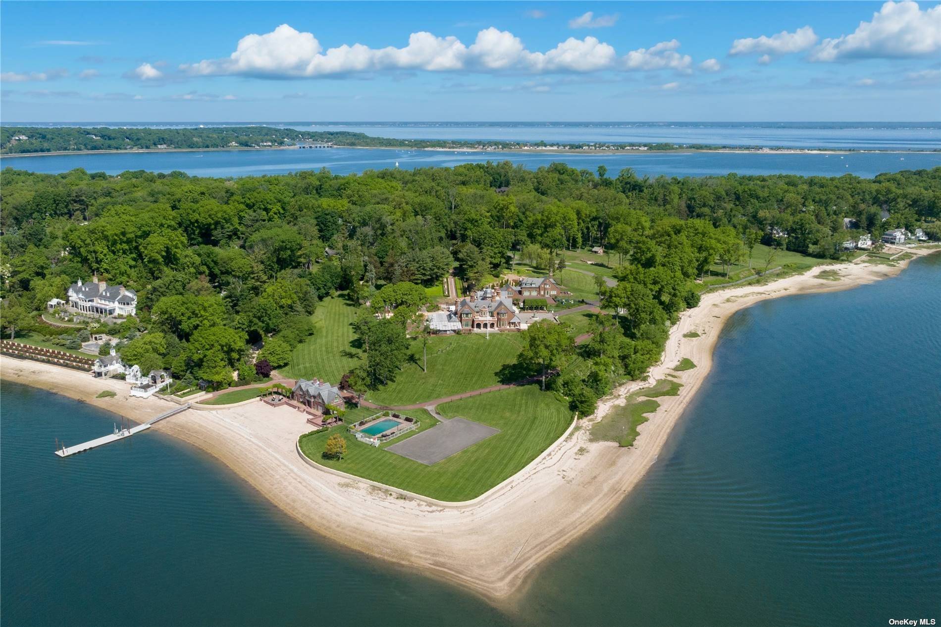 This is an EXTRAORDINARY one of a kind Waterfront estate on over 26 acres with 2000 ft of waterfront on Oyster Bay Harbor.