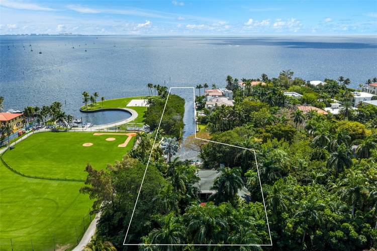 A rare opportunity to create a landmark waterfront estate within the exclusive gated enclave of Four Way Lodge Estates in Coconut Grove.