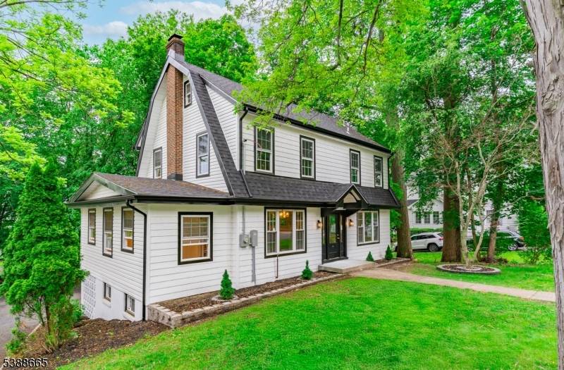 Rare Find ! Welcome to this stunning, fully renovated Colonial, less than a 10 minute walk from the train station.
